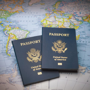 Two U.S. passports on a world map