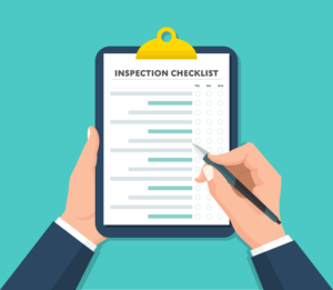 self-inspection checklist on clipboard