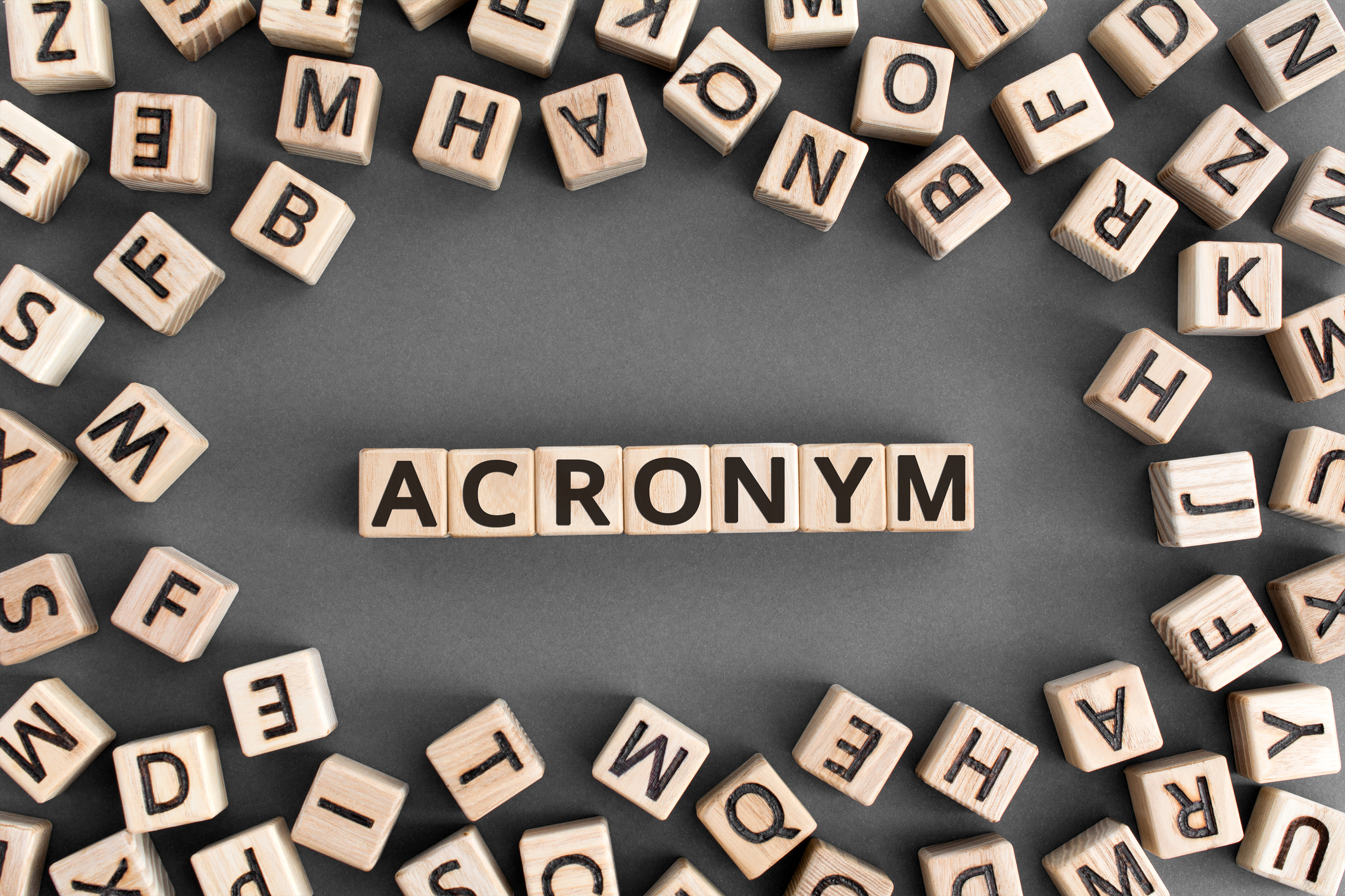 Letter tiles spelling out the word "Acronym"