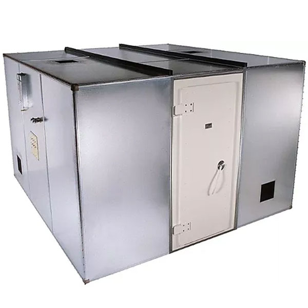 The exterior of a shiny metal enclosure with a white door used for RF shielding