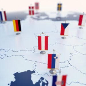 Flag of Austria in focus among other European countries flags. Europe marked with table flags 3d rendering